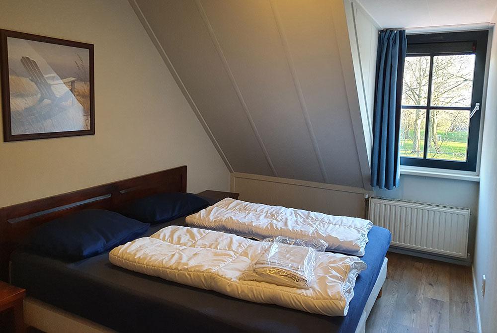 Slaapkamer in de 6-persoons hoevewoning 6D, Landal Résidence ‘t Hof van Haamstede